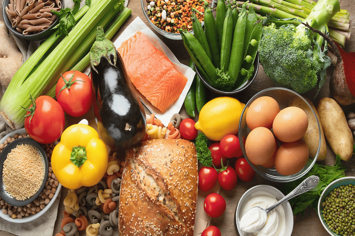 Mediterranean diet foods including olive oil vegetables fish and whole grains